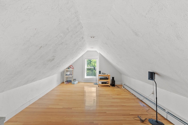 2 Brown Rd, Windham, NH 03087 - additional living space featuring a baseboard heating unit, wood finished floors, and vaulted ceiling