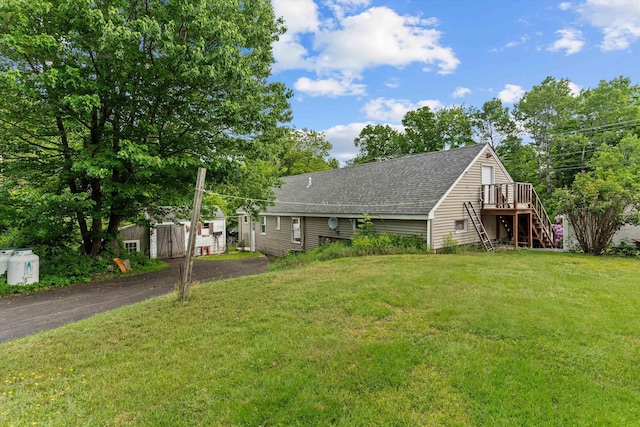 2 Brown Rd, Windham, NH 03087 - view of front of house featuring stairway, roof with shingles, a deck, a front yard, and asphalt driveway