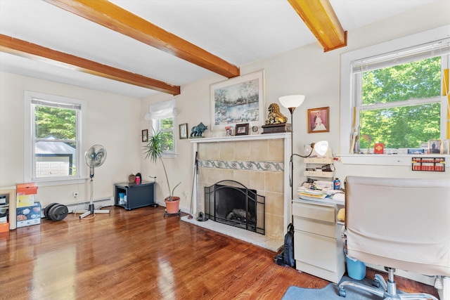 2 Brown Rd, Windham, NH 03087 - living room with beamed ceiling, wood finished floors, a tiled fireplace, and baseboard heating