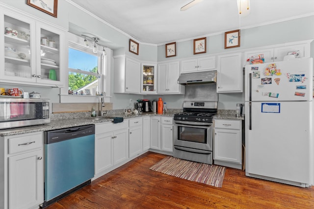2 Brown Rd, Windham, NH 03087 - kitchen featuring appliances with stainless steel finishes, under cabinet range hood, white cabinetry, dark wood finished floors, and ornamental molding