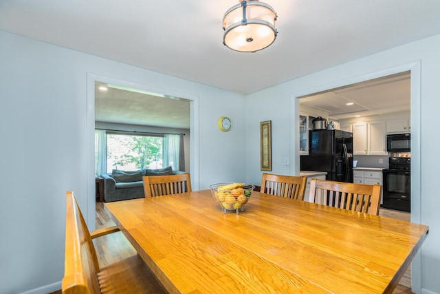19 Harding Rd, Portsmouth, NH 03801 - dining area with light wood-style flooring