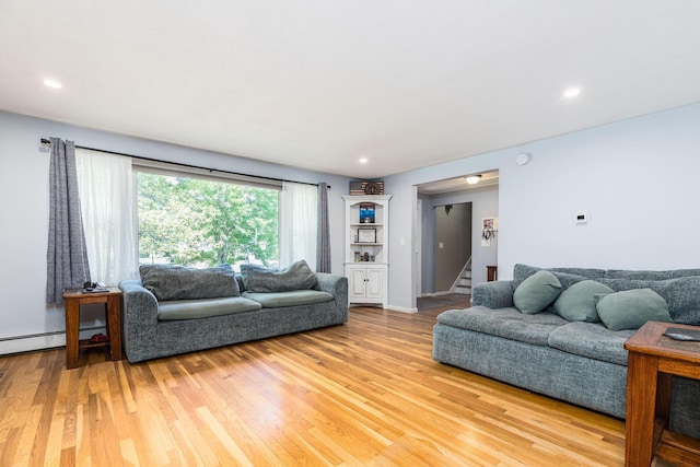 19 Harding Rd, Portsmouth, NH 03801 - living area featuring light wood-style floors, stairs, recessed lighting, and baseboard heating