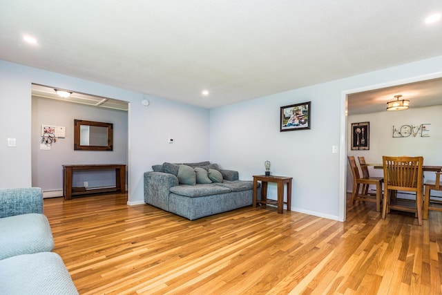 19 Harding Rd, Portsmouth, NH 03801 - living area with light wood finished floors, recessed lighting, and baseboard heating