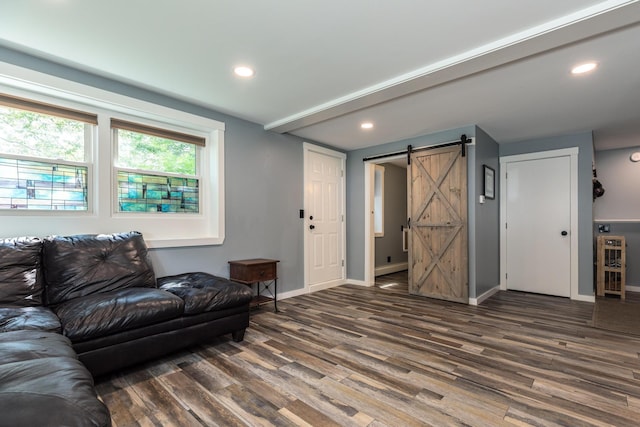 19 Harding Rd, Portsmouth, NH 03801 - living room featuring wood finished floors, a barn door, and recessed lighting