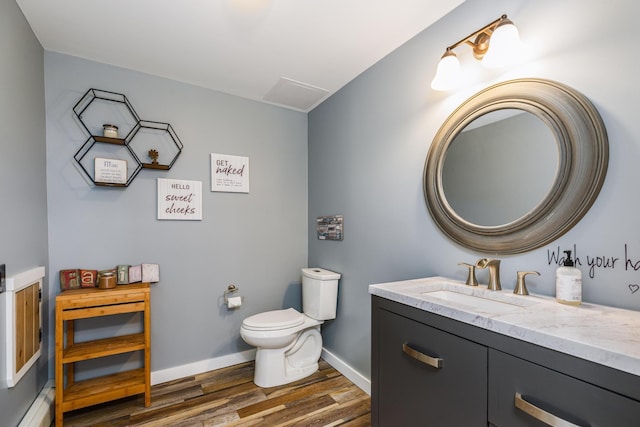 19 Harding Rd, Portsmouth, NH 03801 - bathroom with wood finished floors and vanity