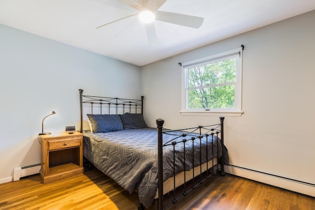 19 Harding Rd, Portsmouth, NH 03801 - bedroom featuring a baseboard radiator, wood finished floors, and a ceiling fan