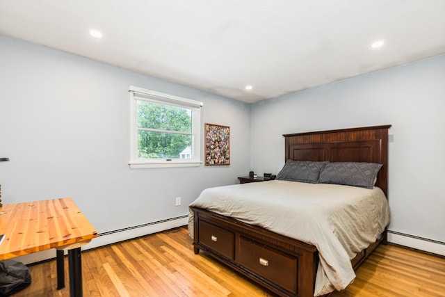 19 Harding Rd, Portsmouth, NH 03801 - bedroom with baseboard heating, light wood-style floors, and recessed lighting