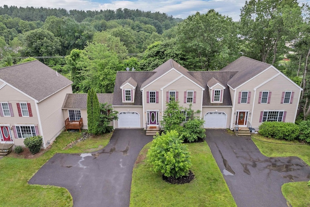 69A Windham Rd Unit A, Hudson, NH 03051 - view of front of home featuring asphalt driveway and a view of trees