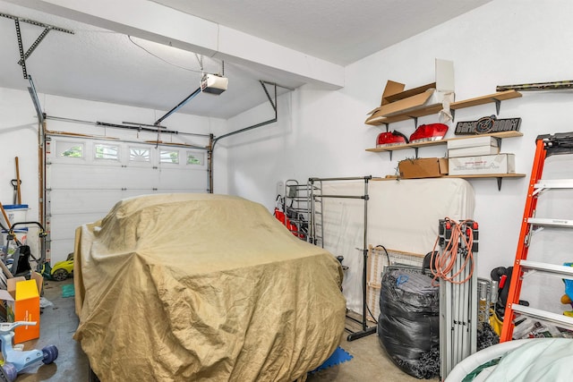 69A Windham Rd Unit A, Hudson, NH 03051 - garage with a garage door opener