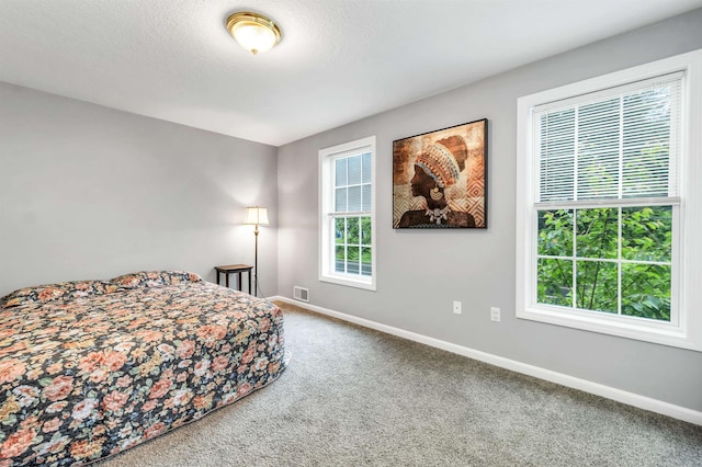 69A Windham Rd Unit A, Hudson, NH 03051 - carpeted bedroom featuring baseboards
