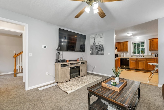 69A Windham Rd Unit A, Hudson, NH 03051 - living area with a ceiling fan, light colored carpet, and stairs