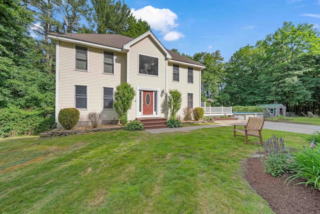 12 Lawrence St, Derry, NH 03038 - view of front of property with a front lawn