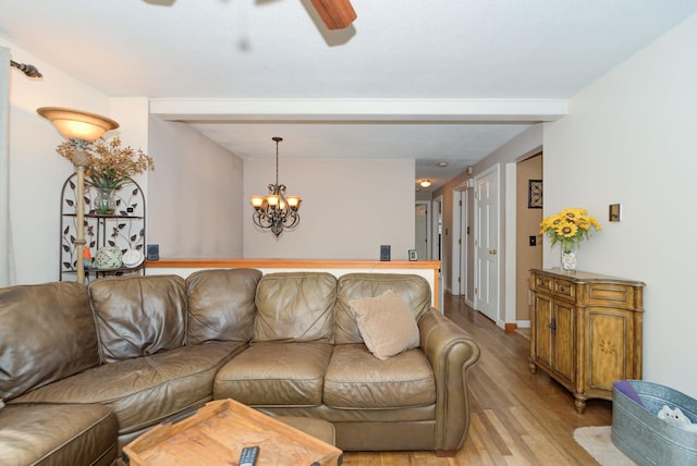 27 Meisner Rd, Salem, NH 03079 - living room featuring light wood-type flooring, ceiling fan, and a chandelier