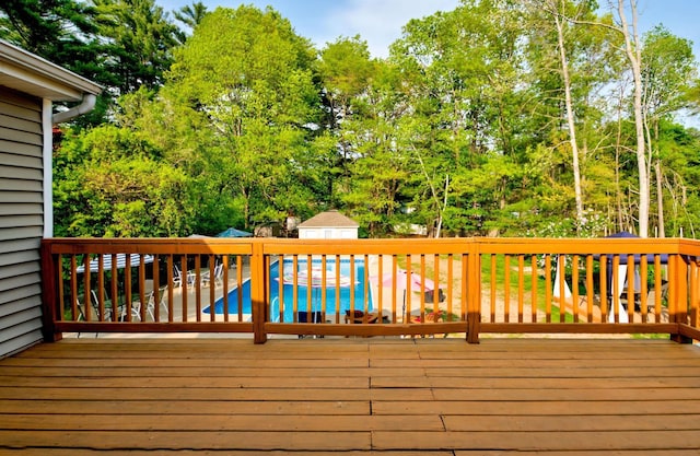 27 Meisner Rd, Salem, NH 03079 - deck with an outdoor pool and view of scattered trees