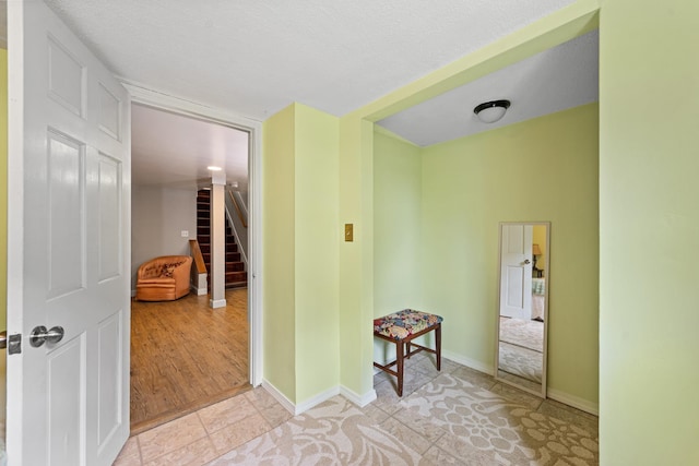 10 Prospect St, Bristol, NH 03222 - hall featuring stairway and baseboards