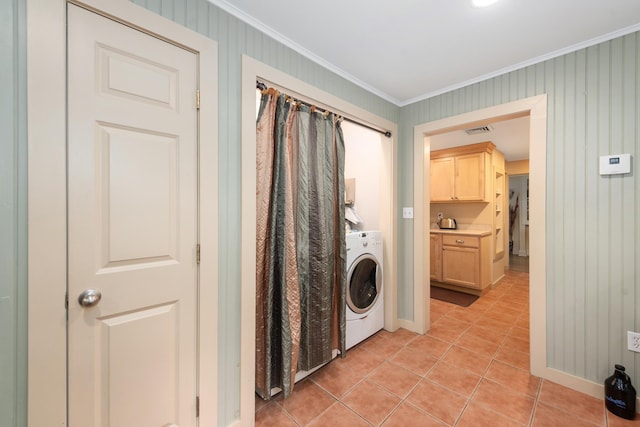 10 Prospect St, Bristol, NH 03222 - laundry room with washer / clothes dryer, ornamental molding, and light tile patterned floors