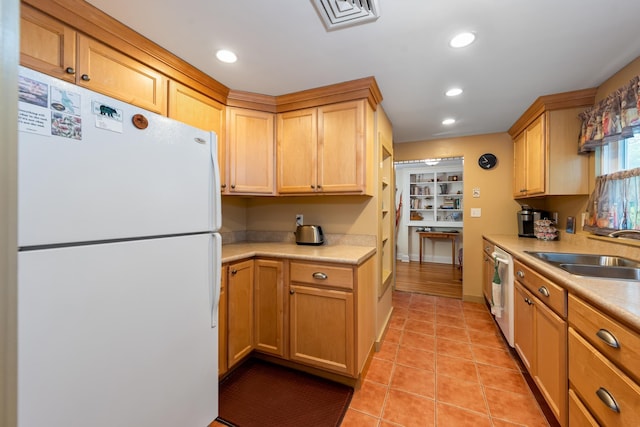 10 Prospect St, Bristol, NH 03222 - kitchen featuring freestanding refrigerator, light countertops, recessed lighting, light tile patterned floors, and dishwashing machine