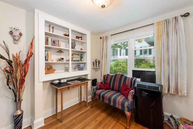 10 Prospect St, Bristol, NH 03222 - sitting room featuring wood finished floors and baseboards