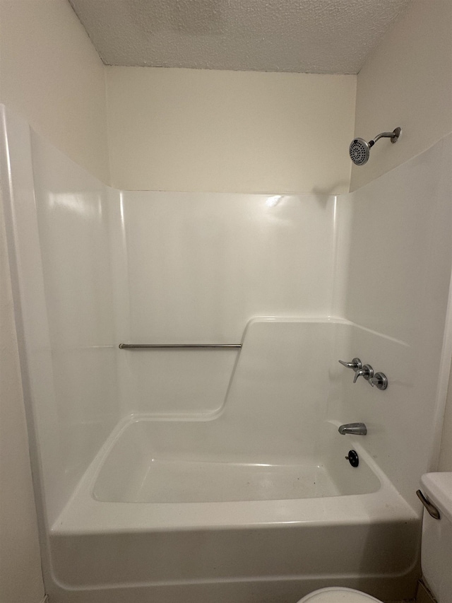 121 Cluff Xing Unit 8, Salem, NH 03079 - full bathroom featuring bathtub / shower combination and a textured ceiling
