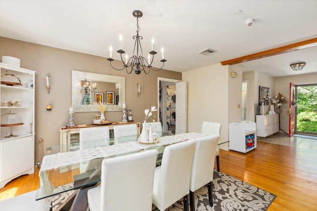 10 Cranberry Rd, Keene, NH 03431 - dining area with a chandelier and wood finished floors