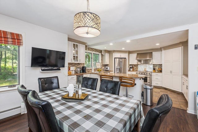 10 Cranberry Rd, Keene, NH 03431 - dining space featuring a baseboard heating unit, dark wood-style flooring, and recessed lighting