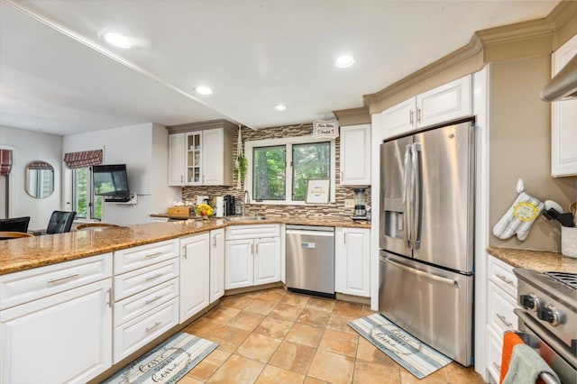 10 Cranberry Rd, Keene, NH 03431 - kitchen with stainless steel appliances, tasteful backsplash, light stone counters, recessed lighting, and white cabinets