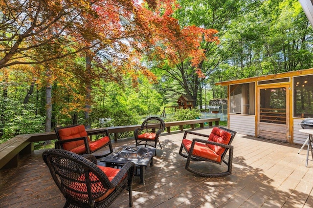 10 Cranberry Rd, Keene, NH 03431 - deck featuring an outdoor fire pit and a sunroom