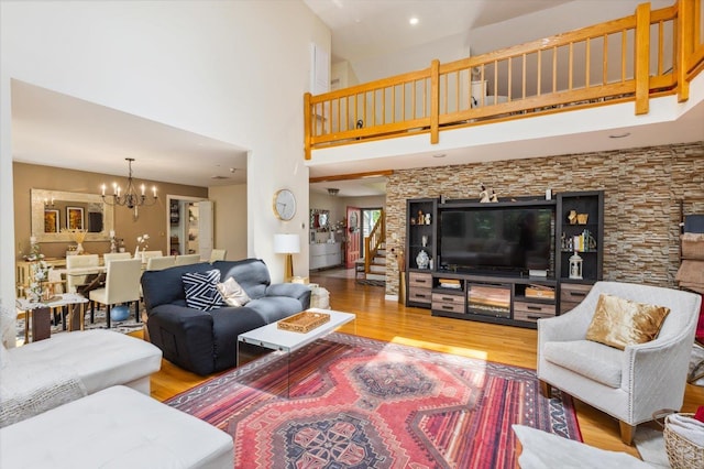 10 Cranberry Rd, Keene, NH 03431 - living room with a chandelier, a high ceiling, wood finished floors, stairway, and recessed lighting