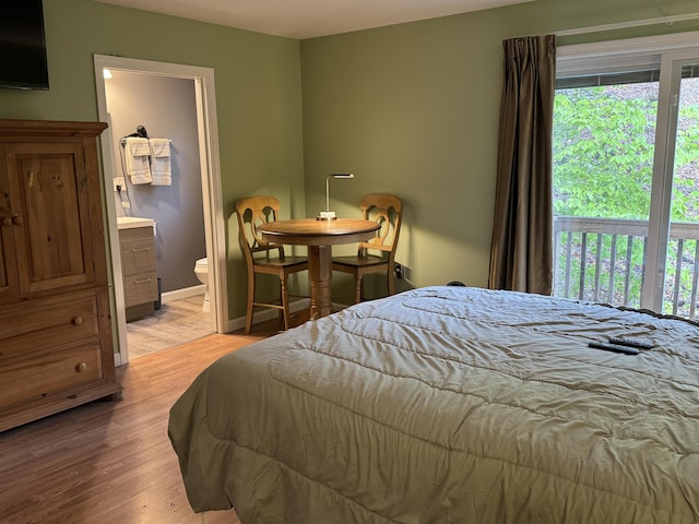 149 Sleepy Hollow Rd, Wakefield, NH 03830 - bedroom with light wood-type flooring and ensuite bathroom