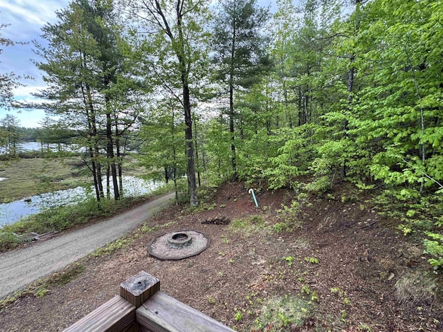 149 Sleepy Hollow Rd, Wakefield, NH 03830 - view of yard with a fire pit and a water view