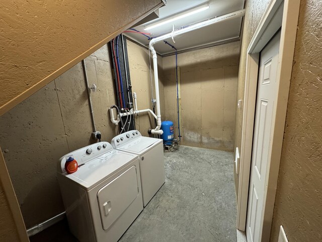 149 Sleepy Hollow Rd, Wakefield, NH 03830 - washroom featuring a textured wall and washing machine and dryer