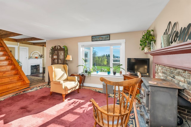 45 Effingham Rd, Ossipee, NH 03864 - sitting room with a fireplace, carpet flooring, and beam ceiling