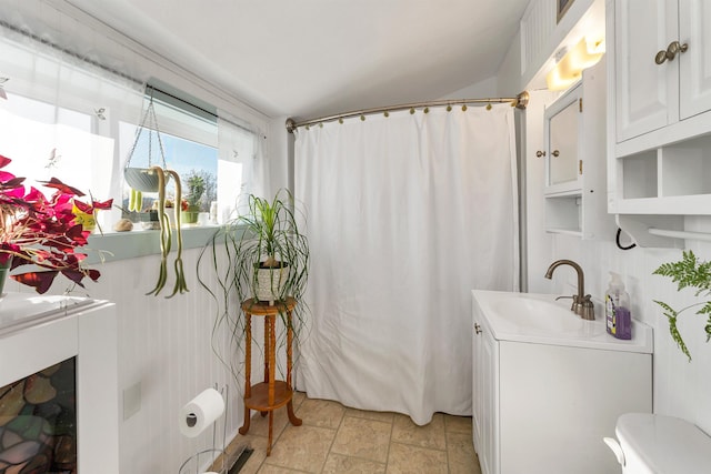 45 Effingham Rd, Ossipee, NH 03864 - full bathroom featuring vanity, stone finish floors, and a shower with curtain