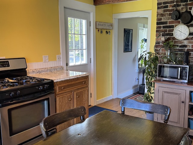 45 Effingham Rd, Ossipee, NH 03864 - kitchen with stainless steel appliances and wood finished floors