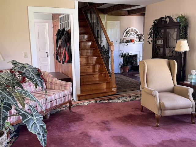 45 Effingham Rd, Ossipee, NH 03864 - carpeted living area with stairs and a fireplace