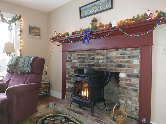 45 Effingham Rd, Ossipee, NH 03864 - living area featuring a wood stove and baseboards