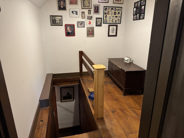 197 Circuit Rd, Ossipee, NH 03864 - staircase featuring hardwood / wood-style floors and lofted ceiling