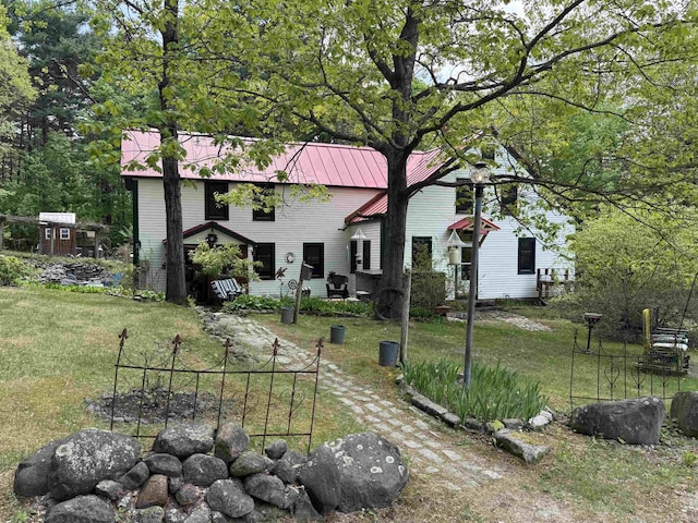 197 Circuit Rd, Ossipee, NH 03864 - view of front of property featuring a front lawn and a metal roof