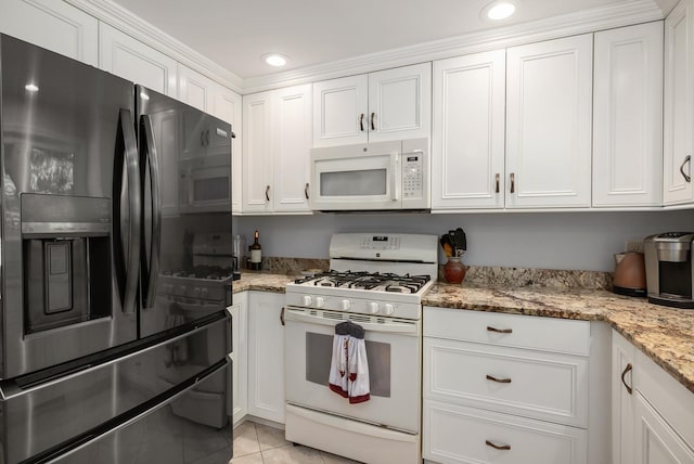 46 Pine Meadows Dr, Exeter, NH 03833 - kitchen featuring white appliances, light tile patterned flooring, white cabinetry, light stone counters, and recessed lighting