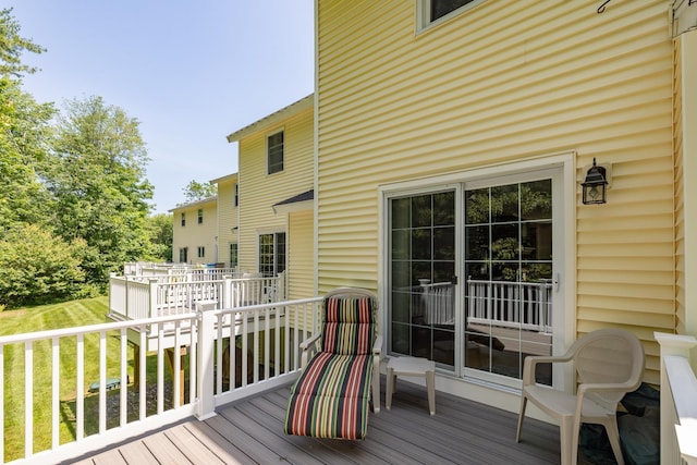 46 Pine Meadows Dr, Exeter, NH 03833 - wooden terrace featuring a lawn