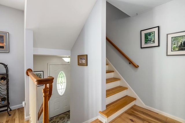 46 Pine Meadows Dr, Exeter, NH 03833 - stairway featuring wood finished floors and baseboards