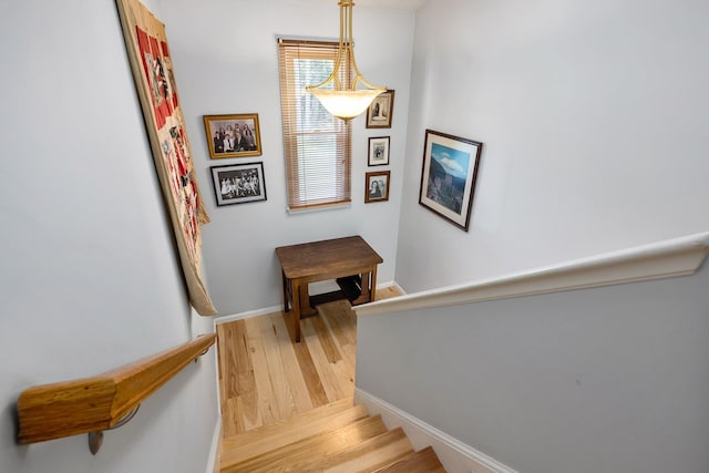 46 Pine Meadows Dr, Exeter, NH 03833 - stairway with wood finished floors and baseboards