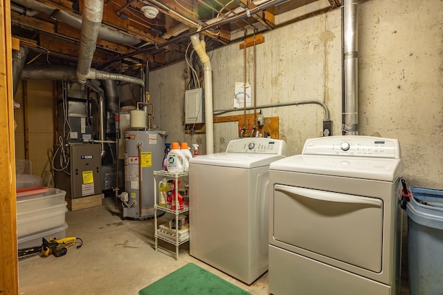 46 Pine Meadows Dr, Exeter, NH 03833 - laundry area featuring gas water heater, washer and dryer, and heating unit