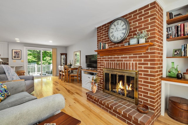 46 Pine Meadows Dr, Exeter, NH 03833 - living room with hardwood / wood-style floors, a fireplace, and recessed lighting