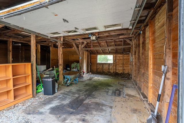 429 Critchett Rd, Candia, NH 03034 - garage featuring a garage door opener