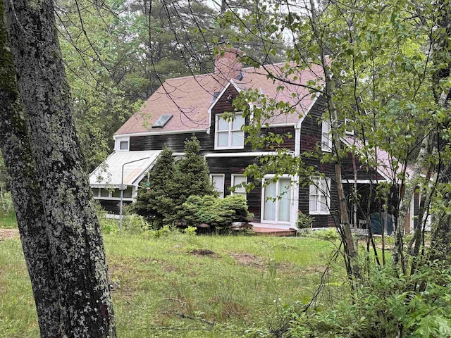 6 Laurel Rd, Ossipee, NH 03814 - view of front of house featuring a shingled roof