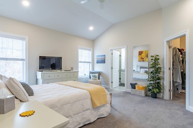 21 Catesby Ln, Londonderry, NH 03053 - bedroom with a walk in closet, carpet floors, lofted ceiling, recessed lighting, and a closet