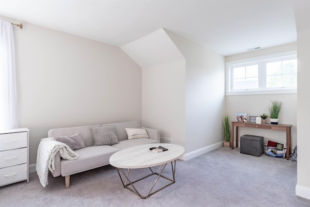 21 Catesby Ln, Londonderry, NH 03053 - living room with light colored carpet and vaulted ceiling
