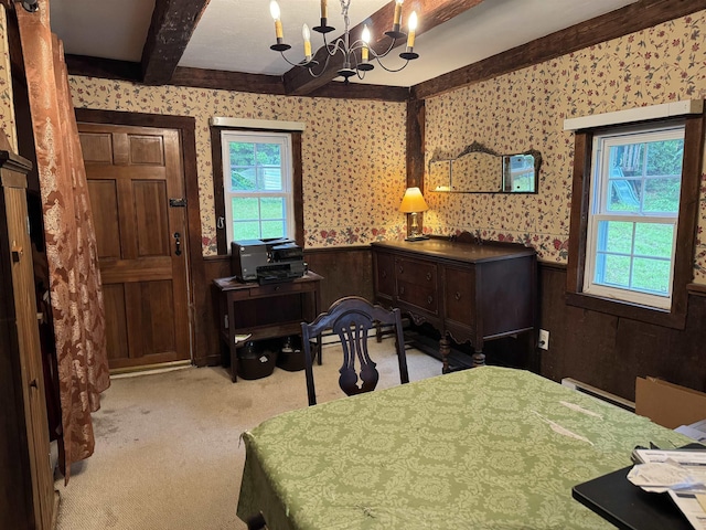 275 Granite Rd, Ossipee, NH 03864 - dining area featuring a wainscoted wall, light colored carpet, beamed ceiling, wallpapered walls, and a chandelier