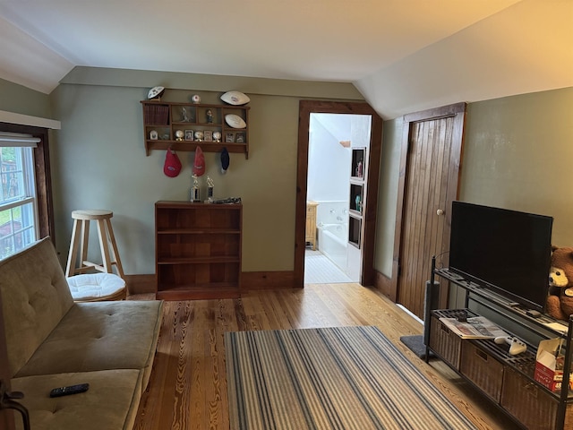275 Granite Rd, Ossipee, NH 03864 - living area featuring vaulted ceiling and wood finished floors